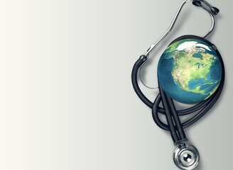 World health concept, globe and stethoscope