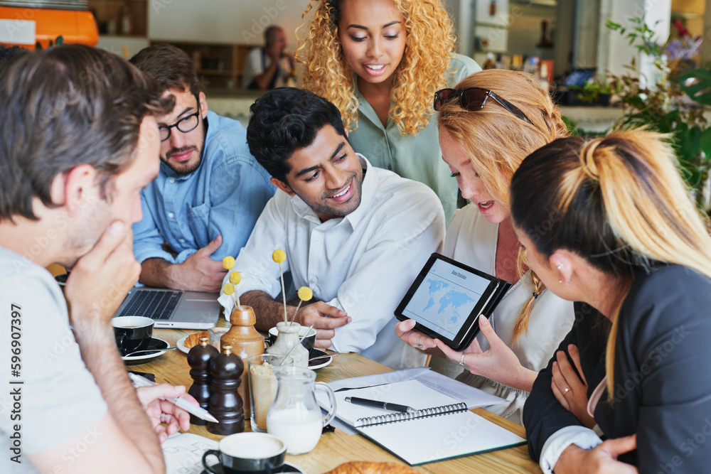Poster what a stellar team. shot of a group of business people having a meeting in a cafe.