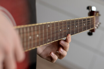 person playing guitar