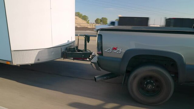 Truck towing Trailer on Highway