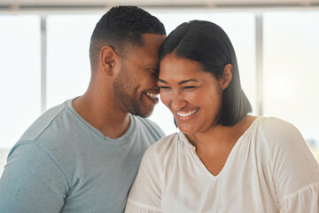 Obraz premium I love being around you. Shot of an affectionate couple standing together in their home.