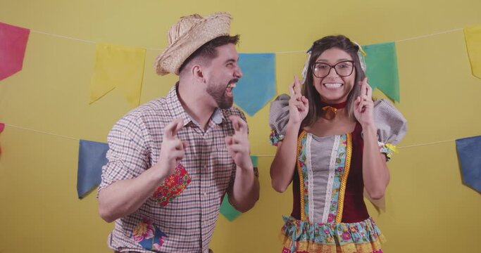 Brazilian couple, dressed in Junina party clothes, S&atilde;o Jo&atilde;o party. Protocol scenes.