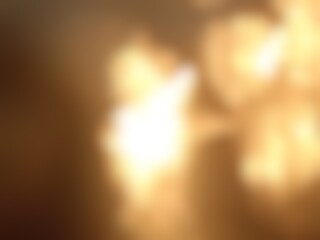 Abstract blur background image of gold color gradient used as an illustration. Designing posters or advertisements.