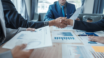 Team of male bookkeepers people working with balance sheet to analyze problems and find solutions to develop business organization and company's stock market system. Common stock and preferred stock