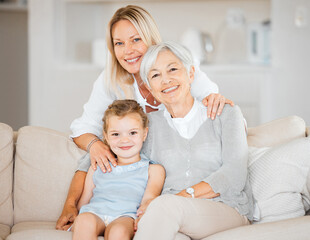 Its a girls day. Shot of a little girl spending time with her mother and grandmother at home.