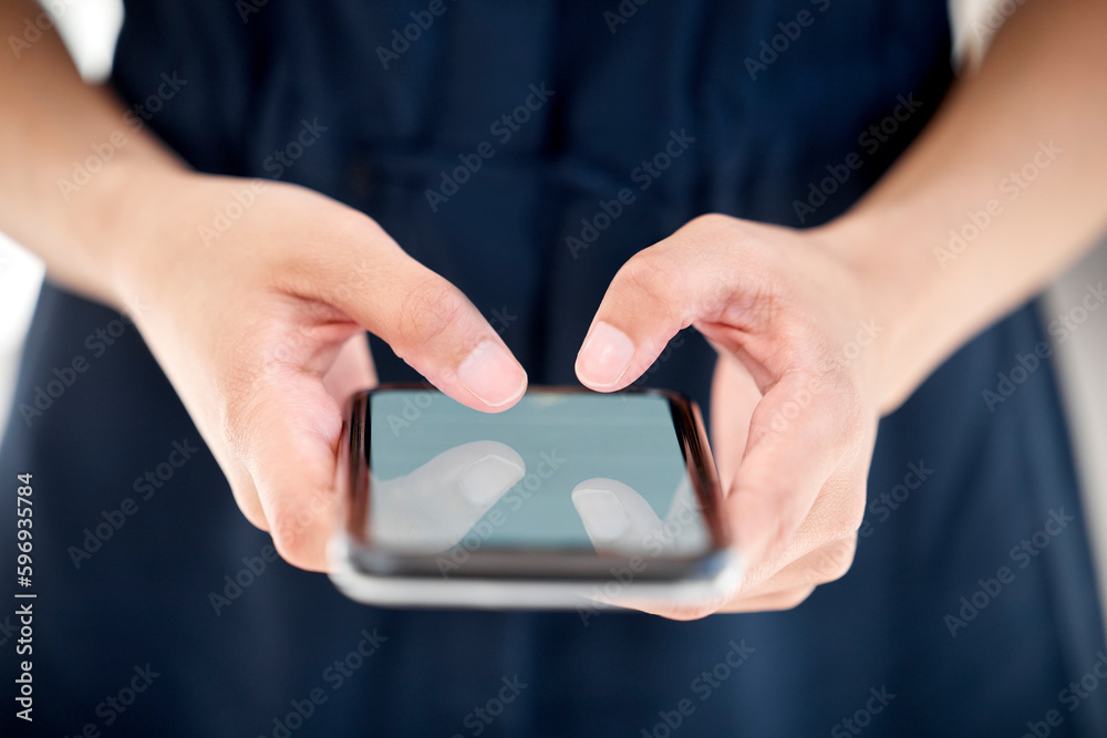 Poster connect with everyone around the world. shot of an unrecognizable businessperson using a phone at wo