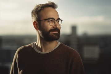 Fototapeta premium Portrait of handsome bearded man wearing eyeglasses looking at camera