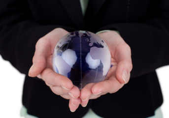 hand holding a glass globe