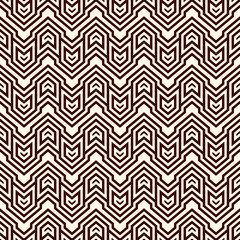 Seamless surface pattern design with arrows and pointers. Repeated chevrons wallpaper. Zigzag lines.