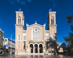Fototapeta na wymiar Metropolitan Cathedral of of the Annunciation, Metropolis, Mitropoli facade exterior view, Attica, Athens, Grece, in a summer sunny day with a blue sky, the cathedral church of the Archbishopric