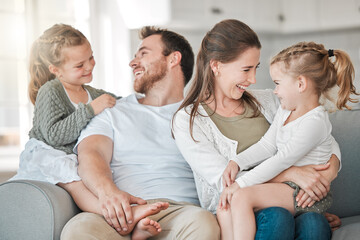 In family life, love is the oil that eases friction. Shot of a young family bonding together on a...