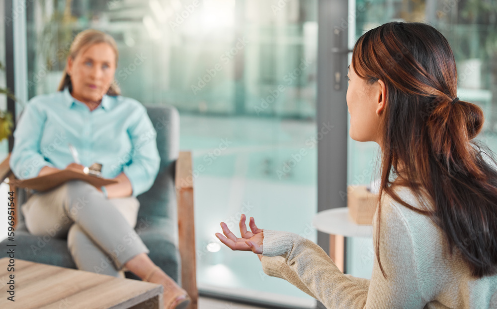 Sticker I turn to my therapist for advice. Shot of a young woman talking during a consultation with her therapist.