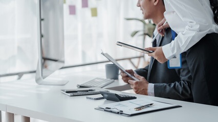 Asian male and female business partners for company registration Working with computer working together, Accrual Basis, conversion Costs, Capital Stock, Current Liabilities, Cash Short and Over