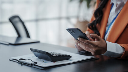 Profile of the firm's accountant for company registration, bookkeeping, asian people working with Deferred Incomes, Drawing Account, stock market, Depletion, Doubtful Debt, Equivalent Units