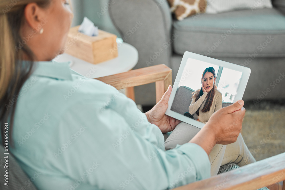 Poster a healthy mind is an asset. shot of a psychologist sitting and using a digital tablet for an online 