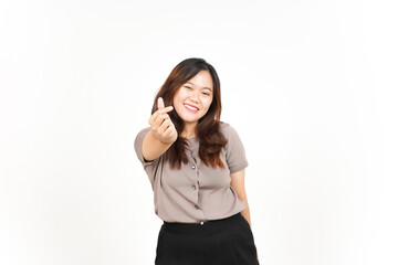 Fototapeta premium An Asian woman is showing the Korean love sign with a white background, smiling brightly