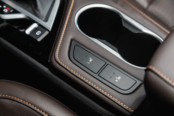 Obraz na płótnie Canvas Close up shot of car seat heating control panel