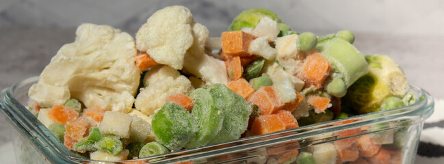 Frozen mixed vegetables for long-term storage. Deep freezing of vegetables. defrosting Frozen food...