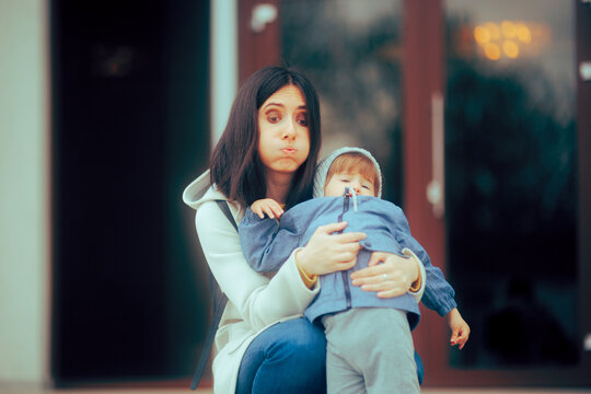 Overwhelmed Mom Stressed by the Terrible Twos Tantrums. Tired mother dealing with public misbehaving from hyperactive child
