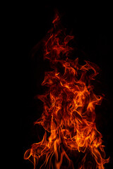 Fototapeta premium Fire blaze flames on black background. Fire burn flame isolated, abstract texture. Flaming explosion with burning effect. Fire wallpaper, abstract art pattern.