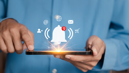 Application notification concept. Businessman using smartphone with application notification icon.