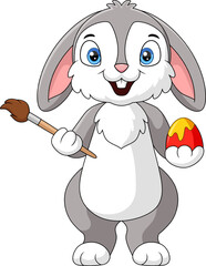 Cute bunny cartoon painting an Easter egg