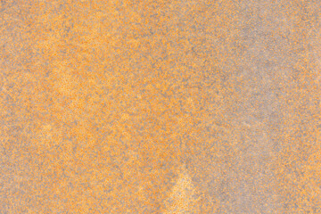 Rust of metals.Corrosive Rust on old iron with a hole. Rusted orange painted metal wall. Rusty metal background with streaks of rust. Old shabby paint.metal rust texture background.