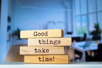 Wooden blocks with words 'Good things take time'.