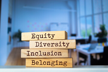 Wooden blocks with words 'Equity, diversity, inclusion, and belonging'.