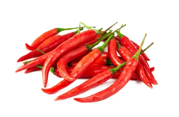 Fotobehang red chili chilli chile cayenne pepper isolated on white background. pile of red chili chilli chile cayenne pepper isolated. heap of red chili chilli chile cayenne pepper isolated © boommaval