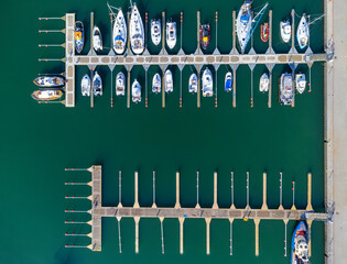 Aerial view landscape port marina Poland Gdynia. Boats, sailboats and yachts parked, seen from above. 