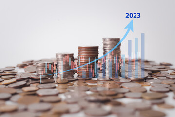 Row of coins for business finance and saving money investment , Money coin stack growing graph with saving concept. plant growing up on coin. Balance savings and investment,2023 - obrazy, fototapety, plakaty
