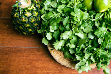fresh greens on wooden background
