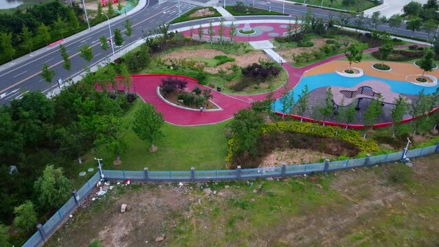 Beautiful roadside park in Nanhai New District, China - Pull-back reverse shot