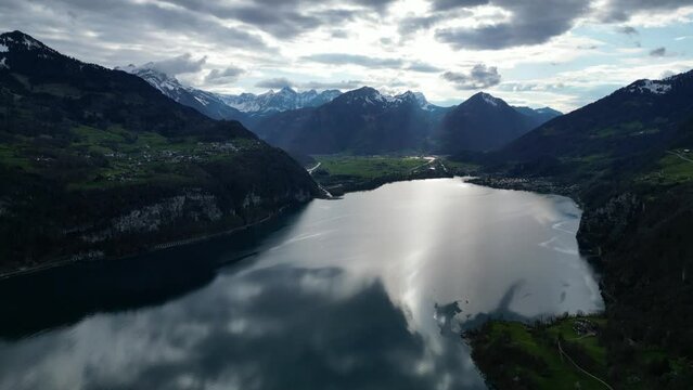 Aerial view of impressive alpine lake. Seerenbach waterfall. Switzerland
