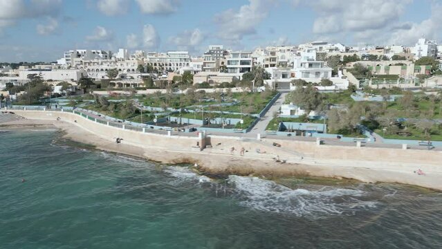 Drone footage over Marsaskala at Malta island, with a view over a beatiful sea