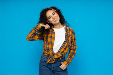 Young woman in casual wearing on blue background