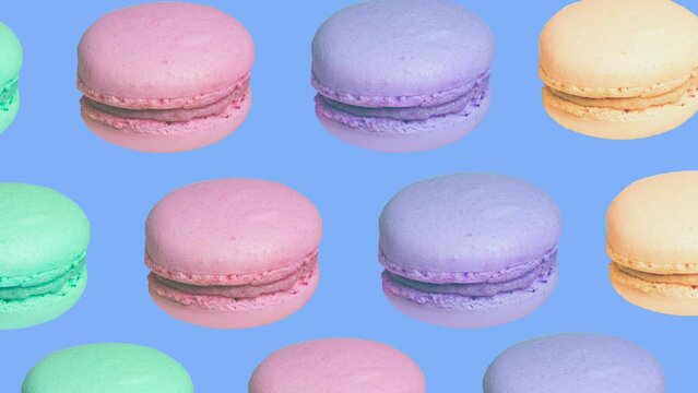 trendy food sweet animation background of macaron different colours cookies on blue background