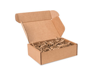 Open cardboard box with paper filling isolated on white background.