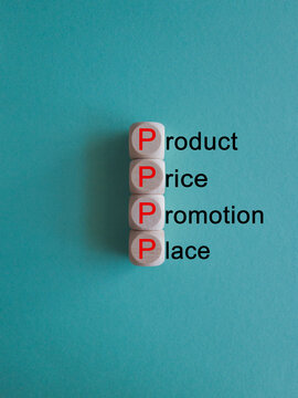 PPPP product price promotion place symbol. Concept words PPPP product price promotion place on wooden cubes on beautiful blue background. Business and PPPP product price promotion place concept.