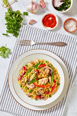 chicken mushroom paella with pepper, green peas