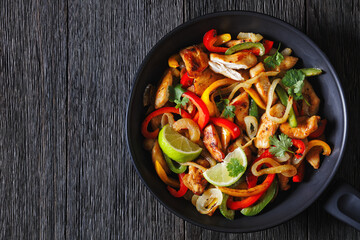 chicken fajitas with bell peppers, onion, spices