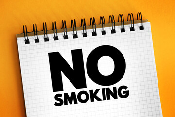No smoking text on notepad, health concept background