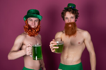 Two young attractive guys. St.Patrick 's Day. Happy couple