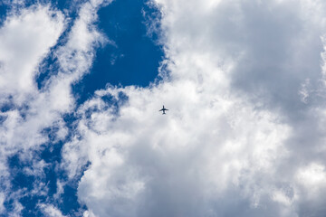 Aircraft flying in the clouds over the island of Corfu in Greece 