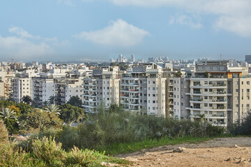 New urban area and construction of new houses, next to the city park