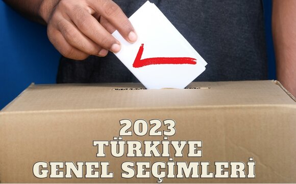 A ballot box with the inscription "2023 Turkish General Elections" in Turkish.  Young male man throwing a red ballot with a check mark on it.