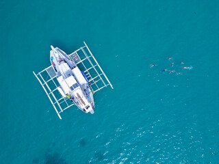 Aerial view of a boat in the islands of Palawan
