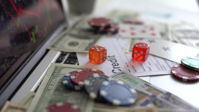 Bitcoin coins with poker cards and chips.