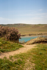 landscape with lake and mountains, Ili River Kazakhstan, Central Asia